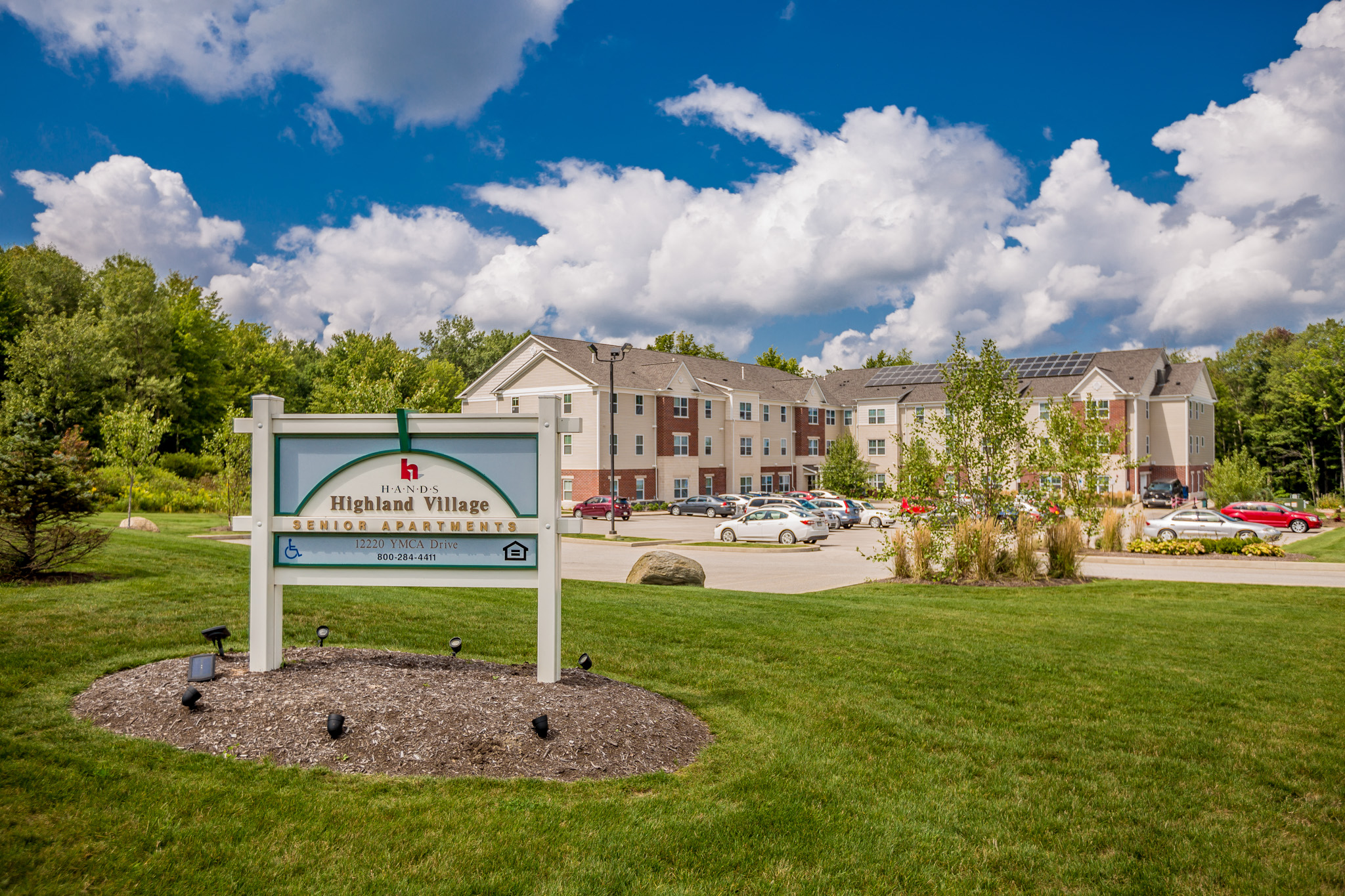 the preserve at ballantyne commons community sign with apartment buildings in the background